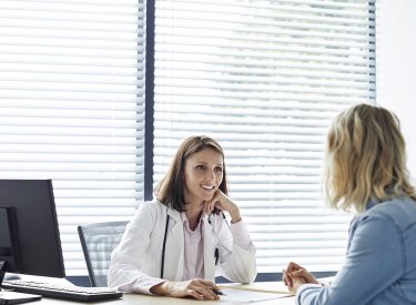 Doctor with a patient in a medical office